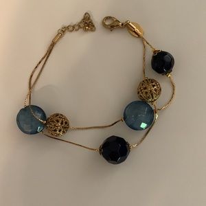 Premier, design, necklace, bracelet, and earrings.